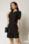 Rochie scurta neagra cu pliu pe fusta si nasturi