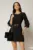 Rochie scurta neagra din stofa cu maneci bufante si curea in talie