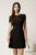Rochie scurta neagra din stofa evazata cu perle la decolteu si buzunare decorative