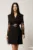 Rochie scurta neagra din stofa tip sacou cu maneci din dantela si curea in talie