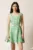 Rochie scurta verde in clos cu model floral 3D si curea in talie