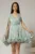 Rochie scurta verde menta de ocazie cu aplicatii florale pe talie din voal peliculizat