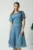 Rochie vaporoasa din voal bleu cu picatele si maneci scurte fluture